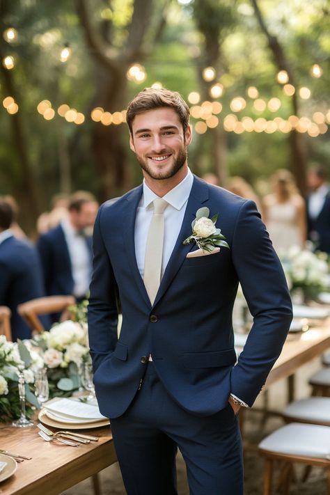 Elevate your wedding style with our top tips for matching groom and groomsmen looks effortlessly. Create a cohesive and stylish bridal party that adds charm to your wedding day. Explore more ideas to inspire your perfect celebration!  #WeddingStyle #GroomAndGroomsmen #WeddingPlanning #BridalPartyLooks #WeddingInspiration #GroomsmenAttire #WeddingTips #MatchingLooks #WeddingFashion #ElegantWeddings #BridalTrends #WeddingDecor #StylishGrooms #ModernWedding #GroomStyle Midnight Blue Groomsmen Suits, Navy Blue And Gold Tuxedo Wedding, Mens Navy Suits, Navy Blue Suit With Emerald Green Tie, Navy Suits Groomsmen Color Schemes, Navy Suit Wedding Party, Navy And Cream Wedding Colors, Groomsmen Summer Attire, Navy Blue Suits For Men Wedding