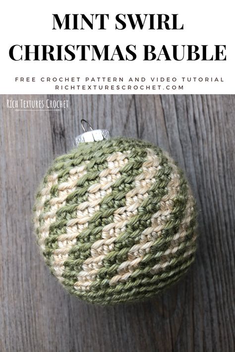 Learn how to crochet this Christmas ornament with this free crochet pattern and video tutorial.  #crochet Crocheted Christmas Baubles Free Pattern, Crocheted Balls Free Pattern, Christmas Bauble Crochet Pattern Free, Christmas Balls Crochet, Christmas Crochet Baubles, Crochet Christmas Baubles Free Pattern, Crochet Christmas Bulbs, Crochet Christmas Balls Pattern Free, Glass Ball Ornament Ideas