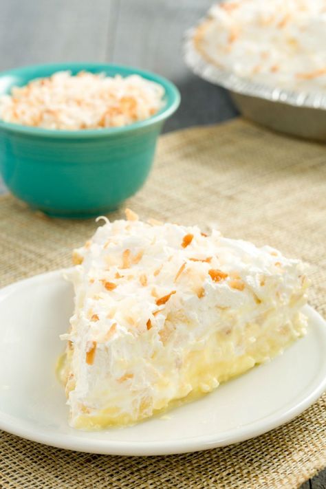 Piña Colada Pie  - HouseBeautiful.com Pina Colada Pie Recipe, Cool Whip Pies, Summer Pie Recipes, Recipes With Cool Whip, Cool Whip Desserts, Summer Pie, Pineapple Desserts, Easy Pie Recipes, Easy Summer Desserts