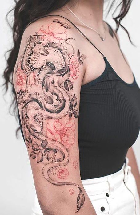 20 Fierce Dragon Tattoo Designs for Women and Meaning (2023) Dragon Chino Tattoo, Blue Dragon Tattoo, Dragon Tattoo Stencil, Black Dragon Tattoo, Dragon Tattoo Arm, Tato Tradisional, Mujeres Tattoo, Around Arm Tattoo, Dragon Tattoos For Men