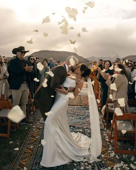 Your Wedding Aesthetics on Instagram: "A Nevada Desert Wedding in Sage and Mustard Tones with Eclectic Decor✨  Lauren and Jon-Michael’s modern, eclectic, and vintage-themed wedding was held at a cactus farm in the stunning Red Rock Valley, Nevada. Thanks to the meticulous work of @emberandstoneevents, every detail, from the vibrant florals and unique color palette to the personalized decor, reflected their vision and deep love for nature and adventure.  Click the link in the bio to read the full story!  Planning, Design & Styling: @emberandstoneevents Venue: @cactusjoes Photographer: @kassiegunnphoto Florals: @nightgardenfloral Dress: @preajames_bridal Makeup: @setandfurylv Hair: @megdelacruzhair Shoes: @bellabelleshoes Headpiece: @mariaelenaheadpieces Accessories: @beltsbucklesbolos  Bar: Preajames Bridal, Red Rock Wedding, Unique Color Palette, Cactus Farm, Rock Valley, Wedding Aesthetics, Nevada Desert, Vibrant Florals, Story Planning