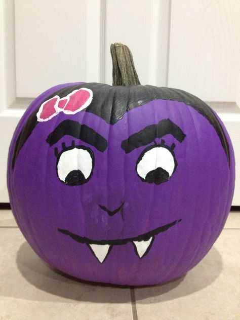 Cute vampire painted pumpkin. Vampire Pumpkin Ideas, Dracula Pumpkin Painted, Halloween Pumpkins Painted Easy, Vampire Painted Pumpkin, Purple Pumpkin Ideas, Purple Painted Pumpkins, Pumpkin Painting Designs Easy, Purple Pumpkin Painting Ideas, Vampire Pumpkin Painting