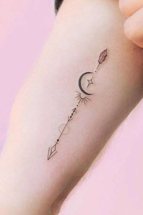 Amazing And Unforgettable Arrow Tattoo Designs ★ Minimalist Arrow Tattoo Arrow Tattoo With Symbols, Unalome Arrow Tattoos For Women, Butterfly And Arrow Tattoo, Arrow Friendship Tattoo, Moon With Arrow Tattoo, Small Bow And Arrow Tattoos For Women, Arrow Symbol Tattoo, Girly Arrow Tattoo, Moon Arrow Tattoo Design