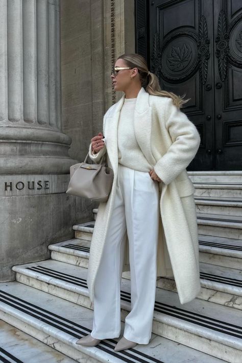 Follow @womens_minimalstyle on Instagram for the latest outfit inspiration ||| Mildagud in winter white | A monochromatic outfit can truly be elegant. All white outfit, winter outfit, winter coat, winter brunch outfit, brunch outfit winter, classy brunch outfit, ponytail, polene bag, white outfit aesthetic, outfit inspiration, outfit ideas, fashion, winter fashion, minimal style, minimal outfit, minimal fashion, timeless outfit, capsule wardrobe. Credit: mildagud All White Outfit Winter, Minimal Fashion Style Woman, January Fashion, January Outfits, Brunch Outfit Winter, Classy Business Outfits, Winter Outfits Aesthetic, Look Polished, Timeless Outfits