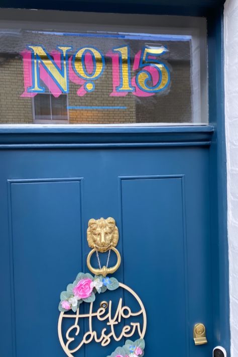 Gold leaf hand painted door number on glass window above front door in navy pink and gold Hand Painted House Number Sign, Retro House Numbers, Door Signs Diy Entrance, Hand Painted House Numbers, Fanlight Number, Hand Painted Front Door, Front Door Number Ideas, Painted House Number Sign, Transom Front Door