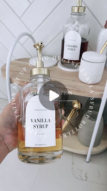 Dina santos on Instagram: "COFFEE STATION SETUP   I have been wanting to restyle my little everyday coffee station and what better way to do it when you find the perfect items for it , right ?  Here I’m using the @kmartaus  2 tier arch blond serving stand and the beautiful syrup bottles just launched from @organisedbyla . Aren’t they just divine?   @organisedbyla was kind enough to give me a discount code  SWEETHOME10 for 10% off storewide . Hope you enjoy this reel and have a wonderful Thursday 🥰. . . . . . . #kmart #kmartfinds #kmartfind #kmartaustralia #kmartaus #kmartstyling #kmarthome #organized #organised #homeorganization #coffeestation #homeorganisation#kmartdeals #storagehacks #organisationgoals #kmartdeals #organisationideas #organisedliving #organisedhome #thehomeedit #kmartbar Kmart Coffee Station, Have A Wonderful Thursday, Wonderful Thursday, Kmart Home, Syrup Bottle, Serving Stand, Kitchen Organisation, Instagram Coffee, The Home Edit