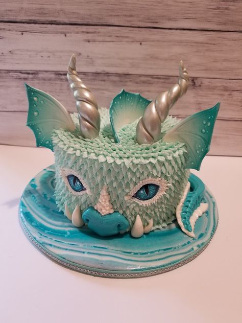 My water dragon cake, done in buttercream with hand painted eyes, fin and sculpted horns. Dragons Cake, Frosting Ideas, Dragon Cakes, Patisserie Fine, Dragon Cake, Cake Wrecks, Painted Eyes, Dragon Birthday, Cakes To Make