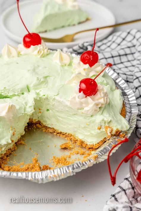 No Bake Pistachio Pie is a wonderfully light and simple pie to make, using only five ingredients, and is perfect for every occasion! #RealHousemoms #nobake #pistachio #pie #dessert #creamcheese #coolwhip #puddingmix #grahamcrackers #stpatricksday Limeade Pie, Weird Desserts, Pistachio Pie, Store Bought Pie Crust, Shamrock Shake, Cherry Limeade, Frozen Cherries, Cherry Recipes, Homemade Whipped Cream