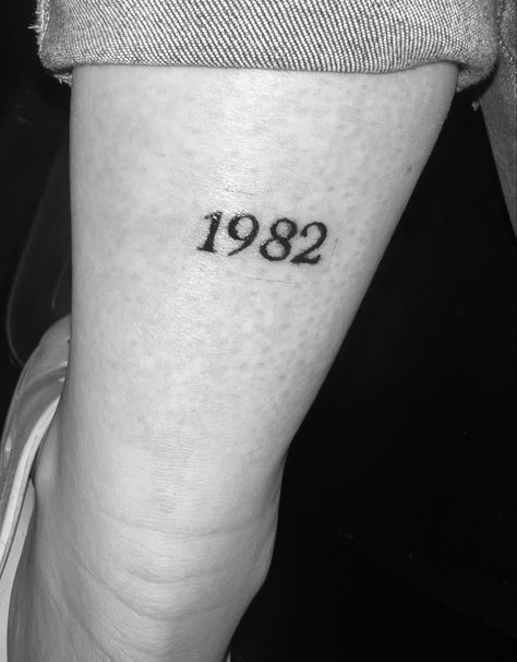 birthday year tattoo  1982 Birthday Year Tattoo, Birthyear Tattoo Ideas, 1982 Tattoo, Year Tattoo, Cowboy Tattoos, Design Drawings, Tattoo Design Drawings, Minimal Tattoo, Tattoo Inspo