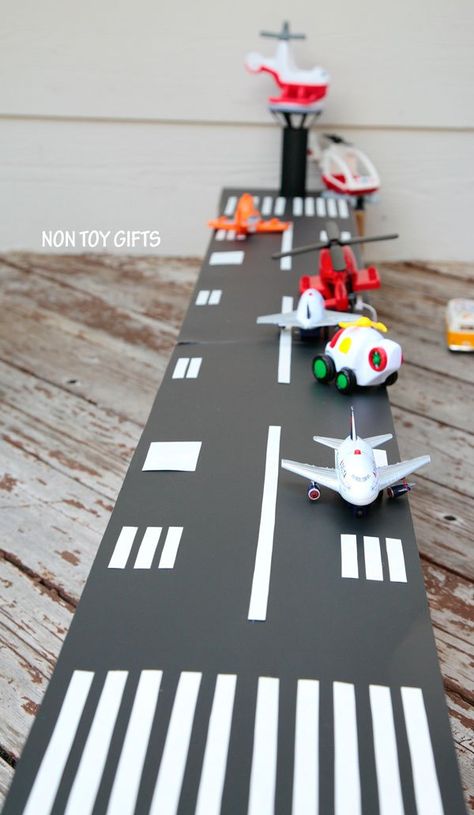 Now this is fun thing to make for the kiddos who like to play airport. I think it’s a great to show kids that they can make things they want to use in their playtime. Fly on over to the link … Cardboard Airport, Cardboard Kids, Airport Ideas, Craft Cardboard, Diy Cardboard Toys, Airplane Crafts, Airplane Birthday Party, Block Play, Non Toy Gifts