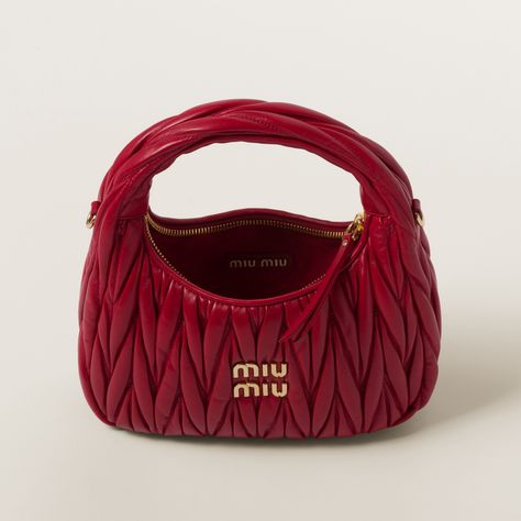 Matelassé motif Leather shoulder strap, length 110 cm Gold-tone hardware Metal lettering logo on the front Zipper closure Cotton satin lining This bag can hold a phone 16 cm x 7.8 cm x 0.76 cm in size The small Miu Miu wallet can be conveniently placed in this bag Miu Miu Hobo Bag, Bags Miu Miu, Miu Miu Bag Aesthetic, Miu Miu Shoulder Bag, Miu Miu Bag Outfit, Mui Mui Bag, Miumiu Bags, Miu Miu Wander, Red Mini Bag