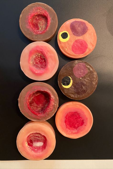 Set (7 Pieces) of silicone pressure injury models for wound care education and teaching. Includes: 1 piece with examples of stage 1, DTI, and an unstageable (slough and eschar) pressure injury, a stage 2 pressure injury, 2 stage 3 pressure injuries, and 2 stage 4 pressure injuries. Fresh Wounds, Stage Makeup Wounds, Pressure Ulcer Staging, Pressure Injury, Abrasion Wound, Laceration Wound Care, Gunshot Wound, Pressure Ulcer, Wound Care