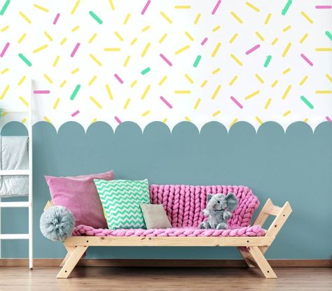 Create an on trend space in any kids room or nursery with this Sprinkles and Scallop Edge Stencil Kit. Paint a background of sprinkles over the top half of the wall and a Scallop Edge Colour block on the bottom half,  for this simple and effective room makeover.  Ideal for a small to medium size wall area.  Stenciling is a very cost effective alternative to using wallpaper.  Stenciling is a DIY decorators dream come true  ( Fun / Unique /  Cost Effective) -  so grab your stencil and paint create your own unique space  PRODUCT SPECIFICATION -Pack contains 2 stencils -  Large sprinkles repeat pattern /  80cm scallop edge repeat pattern -Home decorating stencil made from reusable, washable, flexible 190 micron Mylar -Use the stencil to paint any surface including walls , floors, fabrics and f Scalloped Wall Paint Nursery, Scallop Painted Wall Playroom, Zig Zag Painted Walls, 2 Colour Wall Painting Ideas, Scallop Edge Painted Wall, Scallop Wall Paint, Scalloped Painted Wall, Kids Mural Ideas Bedrooms, Scallop Painted Wall