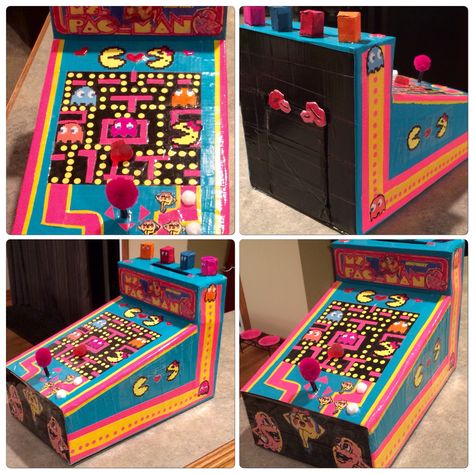 Mrs. Pac Man Arcade Valentine Box We made it with lots of colored duct tape and printed off the characters. The little dots came from Walmart and all was thrown together on the fly...If your hubby happens to save a funky shaped box that looks like a arcade game it will make your job a lot easier! Unique Valentine Box Ideas For Adults, Pac Man Valentine Box Ideas, Valentine Vending Machine Box Ideas, Arcade Valentines Boxes, Valentine Box Vending Machine, Boom Box Valentines Boxes, Cool Valentine Boxes, Unique Valentine Box Ideas, Pac Man Arcade