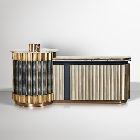 Quba designs are all about an intricate marriage between materials & textures and colours & patterns. Our exquisite bar console is the best example of our design principles. #table #tablesetting #tabletop #tabledecor #tableware #tablescape #tables #luxury #luxurylifestyle #luxuryhome #luxurylife #luxuryliving #ModernLiving #AccentFurniture #ContemporaryFurniture #DecorInspiration #interiorinspiration Art Deco Bar Counter, Curve Console Table, Dark Reception Desk, Bar Table Design, Bar Console, Reception Bar, Bar Unit, Reception Desk Design, Office Table Design