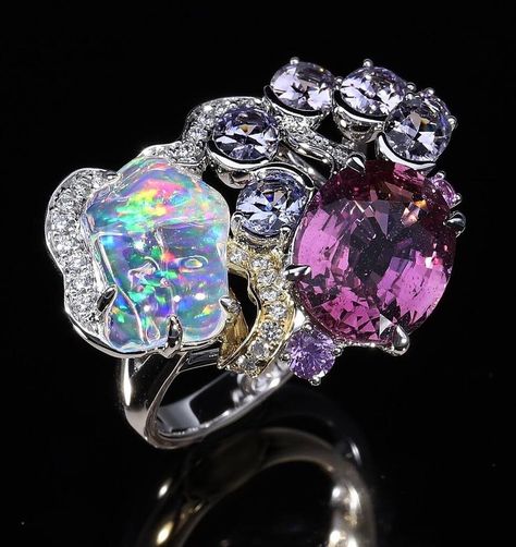 Ring with a water opal, purple sapphire, varying shades of lavender spinels, diamonds, white and yellow gold from Calla Lilly of Singapore Multi Gem Ring, 2023 Picture, Lily Water, Opal Resin, Water Opal, Heavy Rainfall, Lily Design, Jelly Opal, Shades Of Lavender