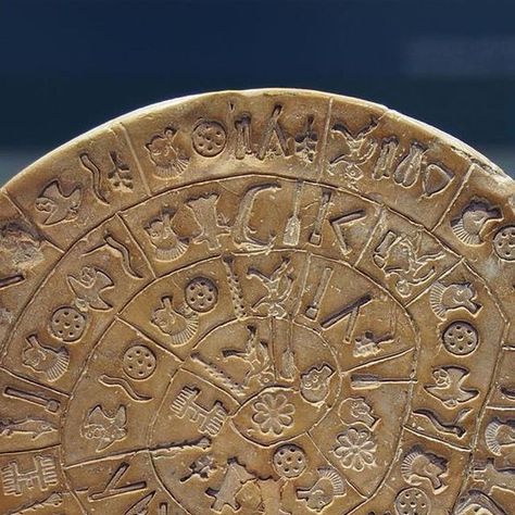 Greek Reporter on Instagram: "The Phaistos Disc (also spelled Phaistos Disk, Phaestos Disc) is a disk of fired clay from the Minoan palace of Phaistos on the island of Crete, possibly dating to the middle or late Minoan Bronze Age. The disk is about 15 cm (5.9 in) in diameter and covered on both sides with a spiral of stamped symbols. The language imprinted on the face of the mysterious disk has never been fully decoded, and its symbols are part of no known alphabet either ancient or modern. . . . . Credit: C messier / Wikipedia . . . . #greece #archaeology #Archaeologist #PhaistosDisc #ancienthistory #ancietgreece #ancientgreeks #hellas #hellada #ellada #grecia" Minoan Palace, Phaistos Disc, Bronze Age, Ancient History, Crete, Archaeology, Palace, The Face, Greece