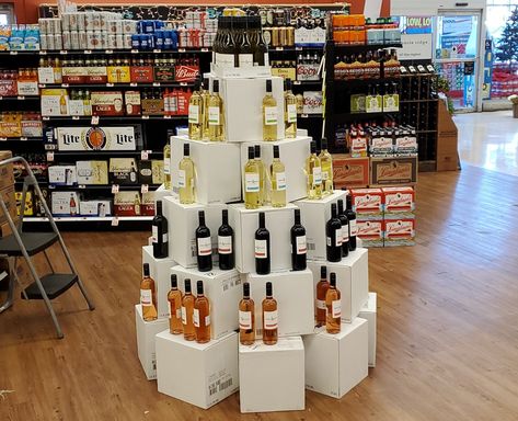 Liquor Store Display Ideas, Alcohol Display, Wine Store Design, Wine Displays, Liquor Display, Wine Tree, Stack Displays, Beer Display, Alcohol Shop