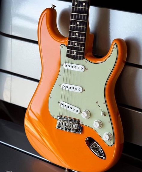 Fender Stratocaster in Capri Orange Electric Guitar Chords, Orange Guitar Aesthetic, Fiesta Red Stratocaster, Purple Stratocaster, Orange Guitar, Fender Guitar Amps, Orange Stratocaster, Fender Stratocaster Sunburst, Electric Guitar Orange