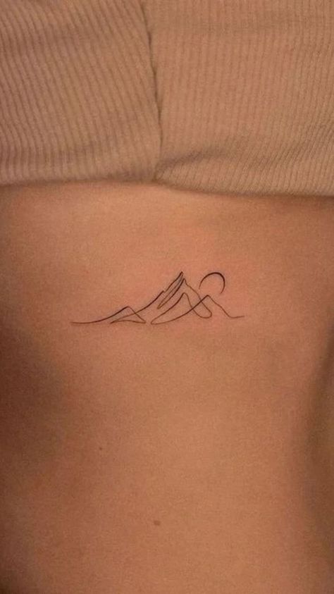 Considering a Fine Line Tattoo? Here's What to Know Before Getting One Tattoo Placement Legs Women, Small Dainty Tattoos For Women With Meaning, Fine Line Chain Tattoo, Love Nature Tattoo, Concealed Tattoo Placement, Tattoos For Thighs For Women, Fine Line Side Tattoos Women, Delicate Tatoos Woman, Side Tatoos Woman