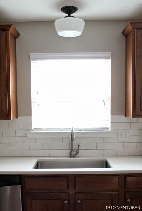 Lights Above Kitchen Sink, Kitchen Windows Above Sink Ideas, Tile Around Window, Kitchen Windows Above Sink, Kitchen Window Sill Ideas, Over Sink Light, Window Over Kitchen Sink, Small Kitchen Lighting Ideas, Window Above Sink