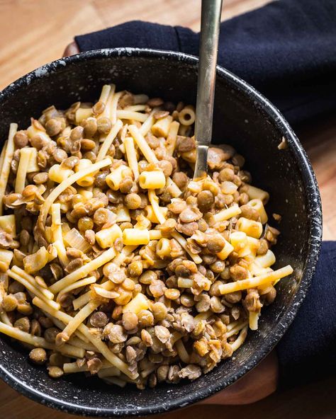 Pasta e lenticchie, or pasta with lentils, is the perfect meal to make when you don't have time for a grocery run but still want something GOOD. This is the perfect excuse to use up any leftover mismatched pasta lying around in your pantry. Toss together with lentils, onions, garlic, and a touch of tomato paste, and top with plenty of parmesan and good extra virgin olive oil for the perfect easy weeknight dinner. #pasta #pastaelenticchie #lentils #lentilrecipes #italianfood Pasta With Lentils, Pantry Pasta, Pasta Con Broccoli, Sip And Feast, Fennel And Orange Salad, Dinner Pasta, Pasta Noodle Recipe, Italian Comfort Food, Lentil Pasta