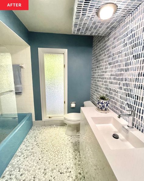 Blue Bathtub Bathroom Ideas, Blue Tub Bathroom Ideas, White Wallpaper Accent Wall, Pebble Flooring, Deep Blue Paint, Karen Graham, Blue Bathtub, Diy Remodeling, Tub Remodel