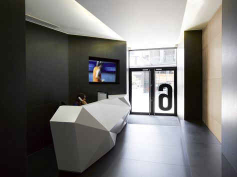 Reception desk in narrow entrance. Narrow Reception Desk, Narrow Reception Area, Lobby Reception Desk, Narrow Entrance, Modern Office Spaces, Information Desk, Architect Office, Modern Workplace, Modern Office Space