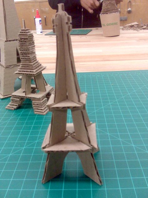 Form and Structure assignment number one. Recreate an object using cardboard. Yup. I'm building with cardboard. I feel a little juvenile, bu... Cardboard Eiffel Tower, Eiffel Tower Template, Eiffel Tower Craft, Diy Eiffel Tower, Cardboard Model, Cardboard Sculpture, Famous Buildings, Cardboard Art, Craft Projects For Kids