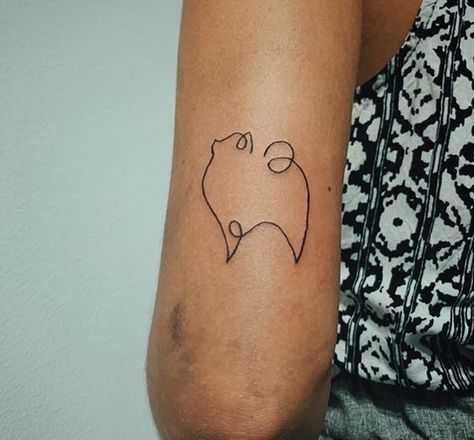 14 Amazing Pomeranian Tattoo Ideas For Every Taste | Page 2 of 3 | PetPress Dog Tattoos Pomeranian, Small Pomeranian Tattoo, Pomeranian Tattoo Ideas, Pom Dog Tattoo, Pomeranian Ear Outline, Dog Line Art Tattoo Pomeranian, Pomeranian Silhouette Tattoo, Pomeranian Ears Tattoo, Pomeranian Tattoo Minimalist