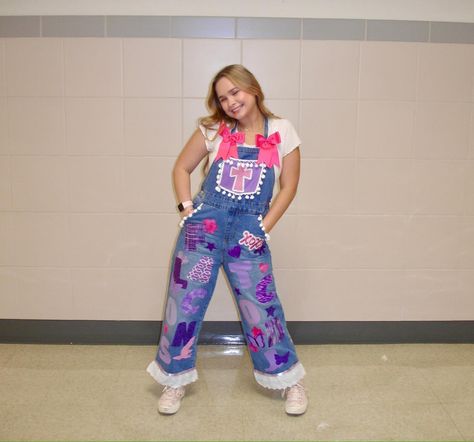 Senior season, senior game, senior night, senior overalls, pose inspo, diy overalls, photo inspo, digital camera, class of 2025, 2ENIOR5, overall inspo Hoco Overalls Ideas, Hoco Overalls, Diy Overalls, Spirit Jeans, Senior Jeans, Senior Season, Texas Homecoming Mums, Senior Games, Senior Overalls