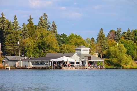 Photo Courtesy of Jason Patrick Ross/Shutterstock.com Lake House Rentals, White Building, Weekend Escape, Drone Photos, House Museum, Adventure Tours, Bike Trails, Lake Michigan, Breathtaking Views