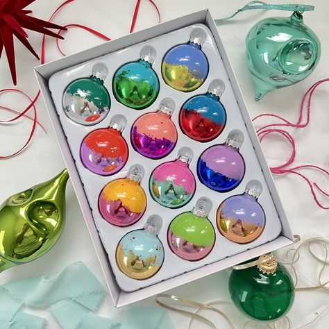 Add some color and fun to your Christmas tree this year! This SET OF 12 ornaments includes 12 multi-colored ornaments with metallic leaf accents. 2 inch glass ornaments with silver hanging caps. Colors and metallic leaf combinations will vary. No two sets are alike! To ensure maximum shine and *wow* factor, these ornaments have not been coated with a protective sealant. Please handle with care and store in a cool, dry place. Please message me for custom color combinations! Rainbow Christmas Decor, Merry And Bright Christmas Tree, Colorful Christmas Ornaments, Rainbow Christmas Tree, Boho Christmas Decor, Rainbow Christmas, Rainbow Decor, Metallic Christmas, Rainbow Tree