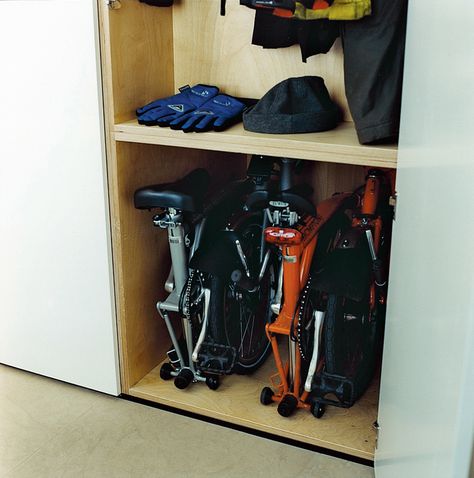 The storage of the bicycles and cycling gear was a major factor in the design of the cupboard space. The floor is plain and simple to clean, which is essential for those wet winter days when they return home from work with muddy wheels and dripping clothing. Brompton Storage, Cycling Gear Storage, Bicycle Gear, Bicycle Storage, Bicycle Rack, Cool Bike Accessories, Mountain Bicycle, Bike Storage, Cycling Gear