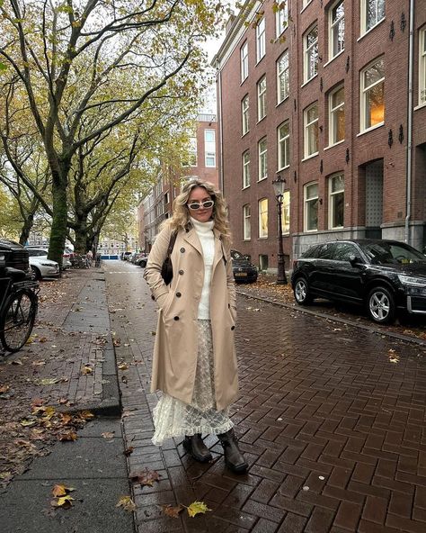 Girl in cream white lace maxi skirt, chunky sweater, trenchcoat, oval brown bag, and biker boots, walking in the fall streets of Amsterdam. Biker Boot Outfit, Biker Boots Outfit, White Lace Maxi Skirt, Style Midsize, Midsize Outfit, Lace Maxi Skirt, Midsize Outfits, White Lace Maxi, Casual Fall Outfit