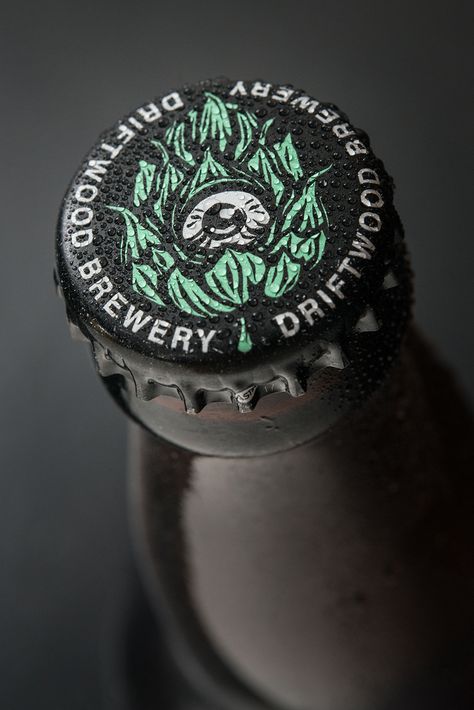 Crown Cap designed for Driftwood Brewery Micro Brewery Design, Beer Bottle Cap, Craft Beer Design, Coffee Shop Logo, Craft Beer Brands, Crown Cap, Beer Branding, Brewery Design, Raised By Wolves