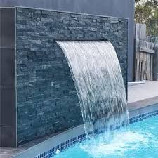 Pool Water Feature Wall, Swimming Pool Fountains, Cladding Tiles, Blue Haven Pools, Swimming Pool Waterfall, Diy Water Feature, Building A Swimming Pool, Water Feature Wall, Piscina Interior