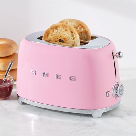 Sale ends soon.  Free Shipping.  Shop SMEG Pink 2-Slice Toaster.  Known for their wonderfully retro refrigerators, SMEG has launched a joyfully designed retro kitchen appliance collection based on the curved and compact lines of postwar design. Pink Toaster, Pink Pots, Retro Kitchen Appliances, Retro Toaster, Retro Refrigerator, Electric Toaster, Smeg Appliances, Kitchen Appliance Storage, Millenial Pink