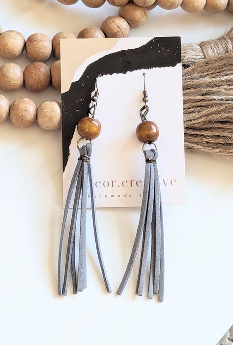 + Style name: Tassel with Bead + Leather strip tassels with silver wire wrap + Drop is approx. 4" + antique bronze earwire See more leather jewelry by liz.cor.creative  https://www.etsy.com/shop/lizcorcreative?ref=seller-platform-mcnav&section_id=43534525 + All lizcorcreative earrings will come packaged on a hand-stamped kraft earring card in a clear sealed bag Free Domestic Shipping Follow along Instagram https://www.instagram.com/lizcorcreative/ Facebook https://www.facebook.com/profile.php?id Beads And Leather Earrings, Lether Earrings, Handmade Rustic Leather Earrings, Rustic Leather Dangle Jewelry, Leather Cord Earrings, 2024 Denim, Cord Earrings, Bohemian Leather Drop Earrings, Leather Tassel Earrings