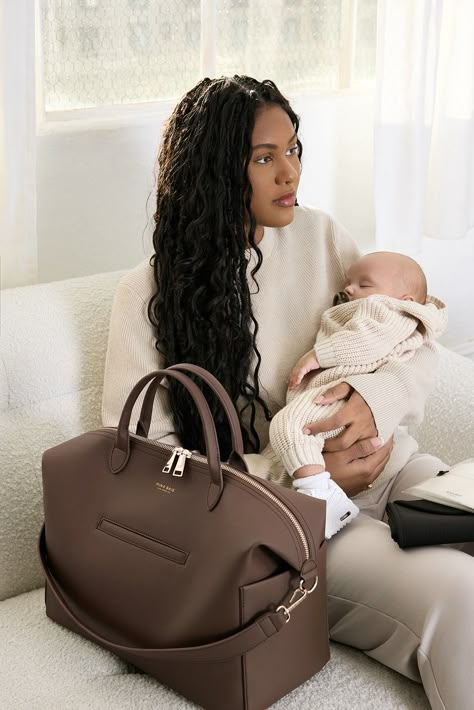 Emmy is our Ultimate Everyday Staple! Our versatile diaper bag is designed with intuitive horizontal packing, ensuring that everything for you and baby is effortlessly visible and within reach. Emmy effortlessly enhances any style. She's not just a bag; she's a style statement. Wear her as a stylish shoulder bag or crossbody, and when you crave hands-free convenience, convert her seamlessly into a backpack. Baby Bags For Mom Aesthetic, Baby Bag Aesthetic, Aesthetic Diaper Bag, Mina Baie Diaper Bag, Diaper Bag Aesthetic, Purses For Moms, Diaper Bag Essentials Newborn, Maternity Bags, Luxury Baby Bags