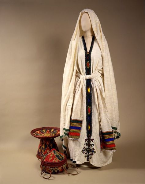 Ethiopian woman’s attire Mid-20th century Jewish Woman Clothing, 20th Century Dress, Jewish Clothing, Biblical Clothing, Hebrew Clothing, Arabian Clothing, Ethiopian Clothing, Ethiopian Dress, Habesha Kemis