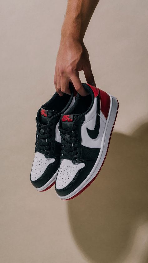 The Air Jordan 1 Low OG releases in the classic 'Black Toe' colorway this Friday, 8/4. Click the link in bio to enter the draw. Enter the draw: https://feature.com/products/jordan-air-jordan-1-low-og-white-black-varsity-red Men Shoes Photography Ideas, Air Jordan 1 Low Outfit Men, Jordan 1 Low Outfit Men, Air Jordans 1 Low, Jordan 1 Low Outfit, Jordan 1 Low Red, Sneakers Photography, Nike Air Jordan Low, Jordan 1 Low Bred