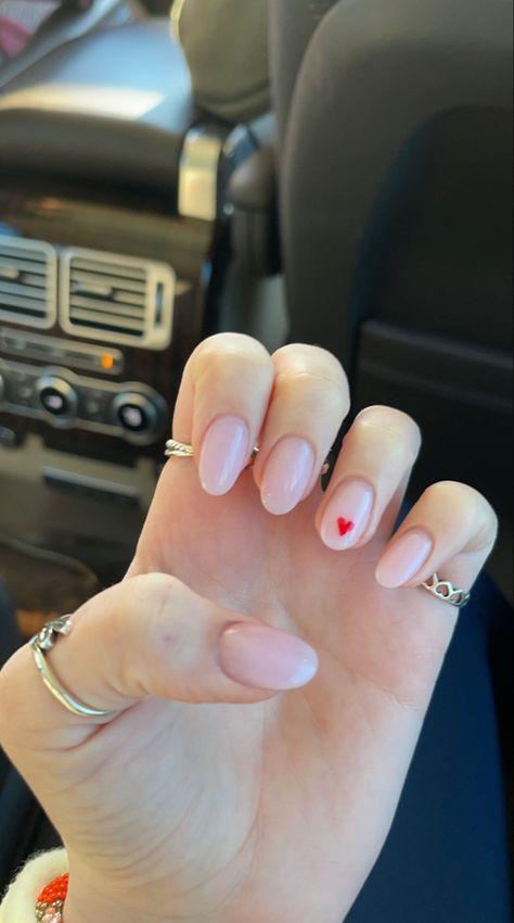 Valentine Nails Natural, Pink Nails Heart On Ring Finger, Soft Pink Nails With Heart, Nude Nails With Pink Heart, Milky Pink Valentines Nails, White Almond Nails With Pink Heart, Clear Nails With Heart Design, Nails With One Heart On Ring Finger, Tiny Red Heart Nails