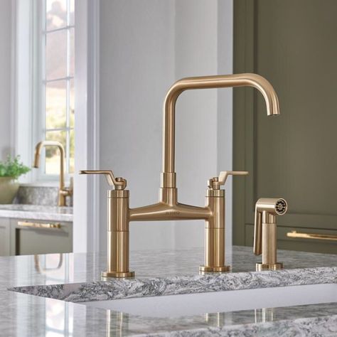 A gold finish adds a touch of warmth to olive green cabinetry in a colorful, stylish kitchen featuring the Litze Bridge Faucet with Square Spout and Industrial Handles in Brilliance Luxe Gold. http://bit.ly/2wcdcuR Brizo Kitchen Faucet, Brizo Litze, Bridge Faucet Kitchen, Bridge Faucet, Sky Lights, Bidet Bathroom, Barn Interior, Pot Filler Faucet, Bidet Toilet Seat