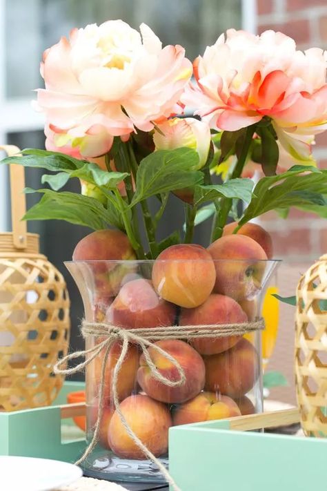 18  Amazing Peach Themed Baby Shower Ideas (  Free Invitation) One Sweet Peach Table Centerpieces, Peach Table Centerpieces, Peach Floral Centerpieces, Sage And Peach Wedding Centerpieces, Decorating With Peaches, Peach Theme Party Favors, Peach Color Party Decorations, Peach Themed Kitchen, Peaches Centerpiece