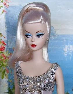 Vintage Barbie make-up with red lips, blue eyeshadow, and black eyeliner. Barbie Makeup Blue Eyeshadow, Barbie Blue Eyeshadow, Blue Barbie Makeup, Blue Eyeshadow Red Lipstick, Vintage Barbie Makeup, Blue Eyeshadow Red Lips, Make Up Lips, What Is Makeup, Daytime Makeup