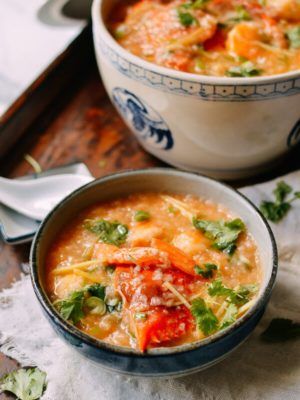 Seafood Congee, by thewoksoflife.com Pescetarian Dinner, Congee Instant Pot, Seafood Congee, Dinner Chinese, Shrimp Stock, Wok Of Life, Woks Of Life, The Woks Of Life, Rice Porridge