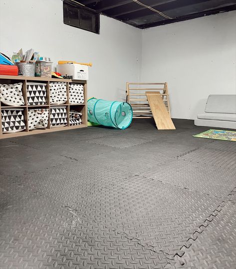 Playroom Unfinished Basement, Basement Playroom Makeover, Unfinished Basement Playroom Ideas Concrete Floors, Unfinished Basement Kids Playroom, Basement Playroom Ideas Unfinished, Tiny Basement Playroom, Budget Friendly Basement Remodel, Unfinished Basement Play Area, Garage Turned Into Playroom