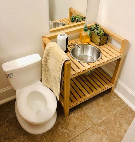 Rachel Montessori Military Mom on Instagram: “Functioning Toddler Bathroom! We finally finished our functioning toddler bathroom! Complete with a toddler sized potty, functioning sink…” Montessori Sink Diy, Ikea Montessori Hacks, Toddler Self Care Station, Montessori Self Care Station, Montessori Home Setup, Montessori Self Care, Montessori Bathroom, Self Care Station, Ikea Montessori