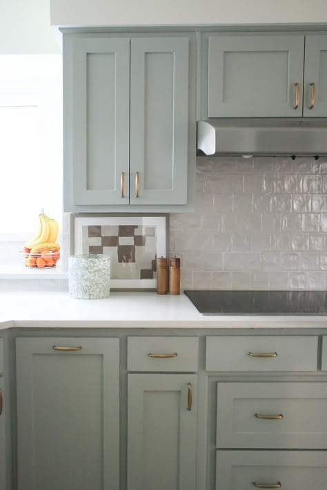 Light blue, green painted cabinets with gold hardware and zellige backsplash. Timeless Kitchen Backsplash, Backsplash Styles, Paint Colors For Cabinets, Blue Painted Cabinets, Teal Kitchen Cabinets, Blue Green Kitchen, Teal Cabinets, Best Blue Paint Colors, Teal Kitchen